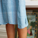 RUFFLE SHIRT DRESS, LIGHT BLUE - SAAKI