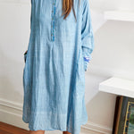 RUFFLE SHIRT DRESS, LIGHT BLUE - SAAKI