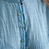 RUFFLE SHIRT DRESS, LIGHT BLUE - SAAKI