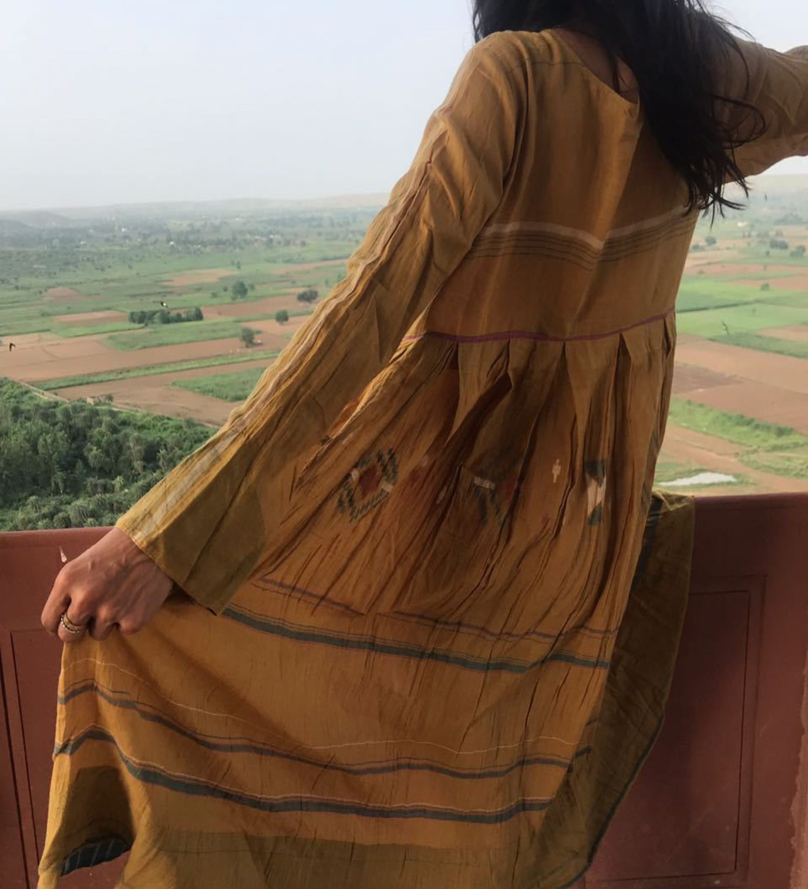 PLEATED BABYDOLL DRESS, CARAMEL YELLOW - SAAKI